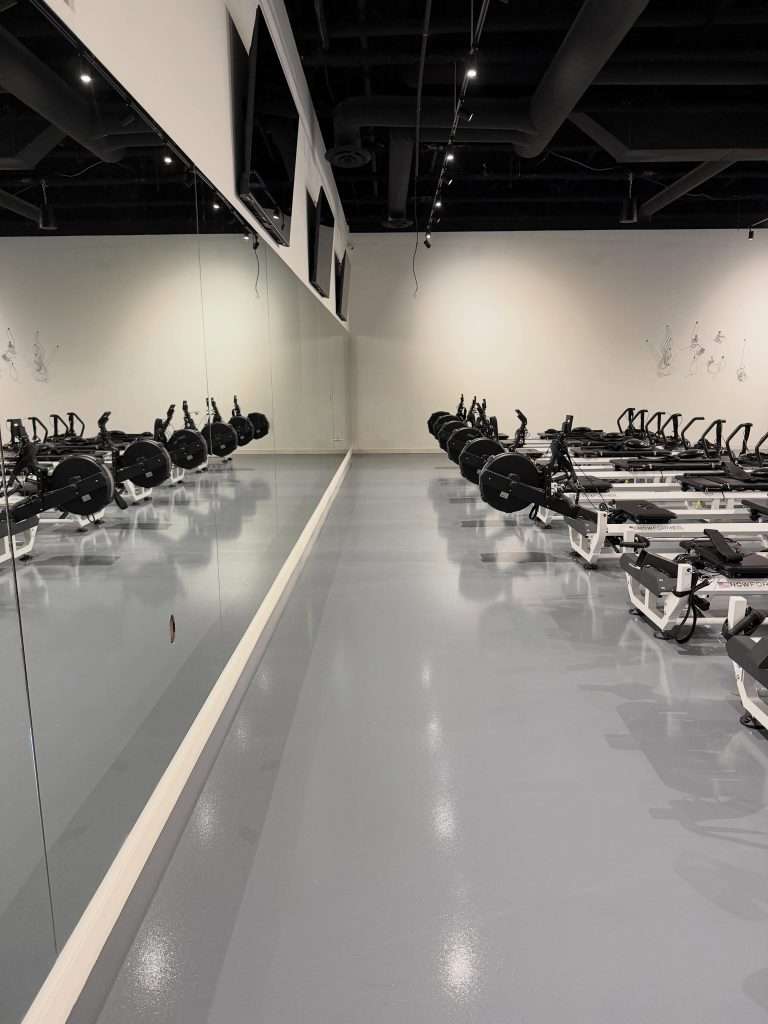 Strong Pilates grind and seal concrete floor in Surrey BC